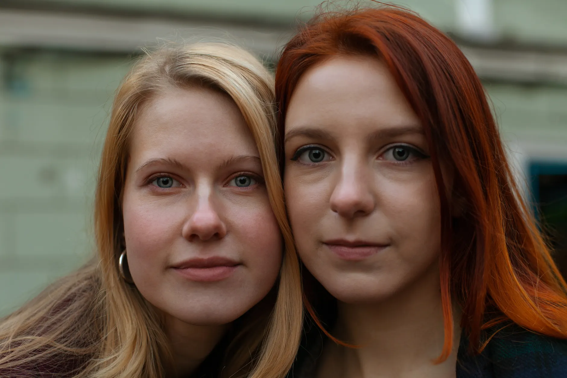 Two identical objects or people, symbolizing 'alike'